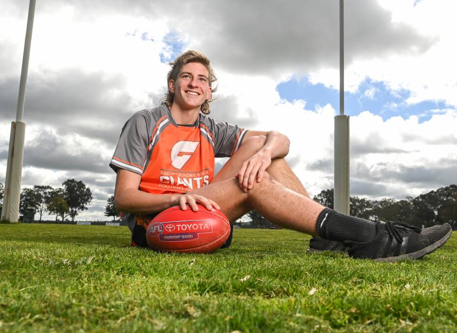 Nathan Wardius will be wearing the same colours next season, but it will the AFL's GWS Giants.