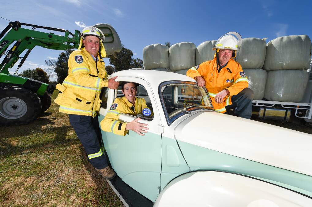 The Ford Prefect ute pictured in 2019 with Howlong RFS members Clinton Franks, Rorey McNamara and David Lewis will be available again at Sunday's monster auction.