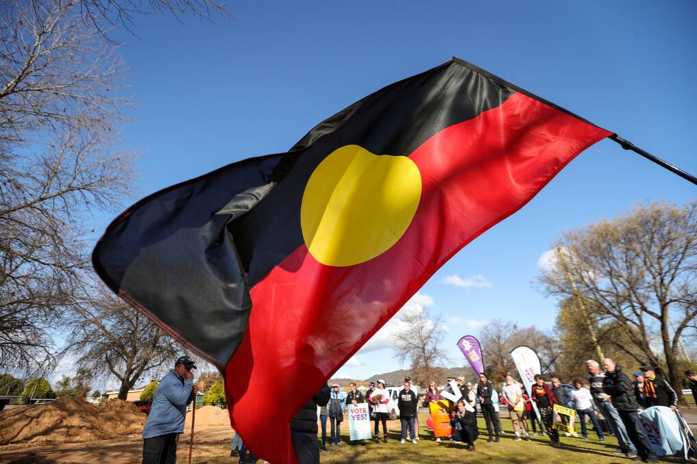 An Indigenous flag flies during AFL champion Michael Long's visit to the Border on September 5 and 6. Picture By James Wiltshire