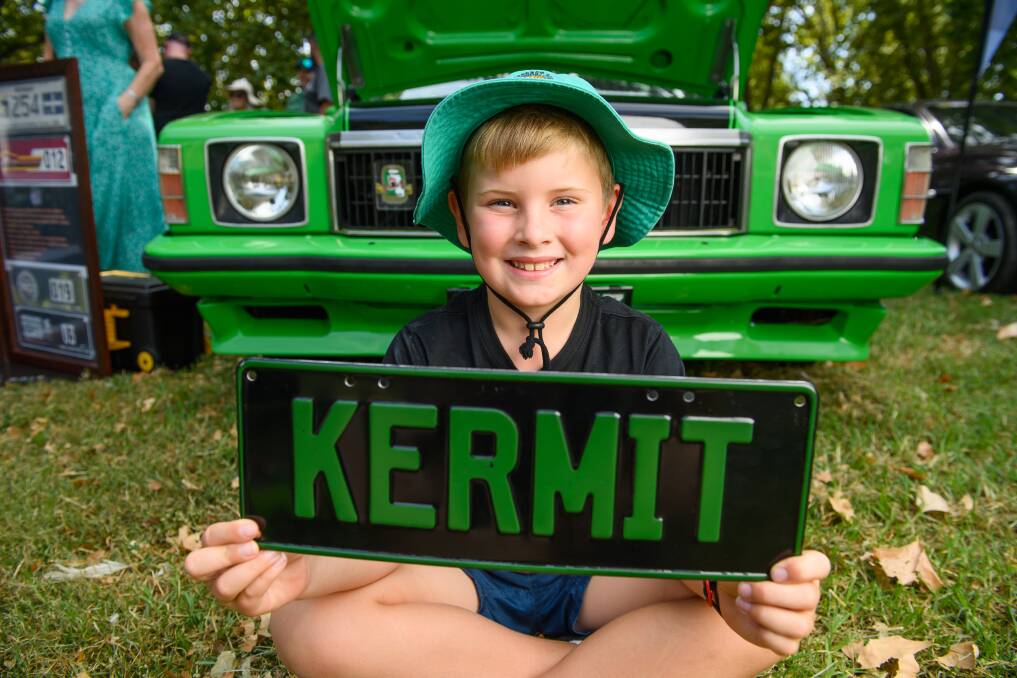 Jude Heinrich, 7, of Thurgoona, has found his favourite car at the Monaros on the Murray Show and Shine, a 1977 HX GTS four door nicknamed Kermit. Picture by Mark Jesser