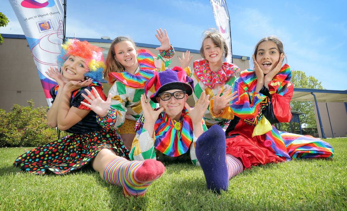 ROVING CLOWNS: Emma King, Samantha Thomson, Thomas Keatings, Ellen Paterson and Caitlyn Mosinski join in the fun at the 2013 Applause Festival.