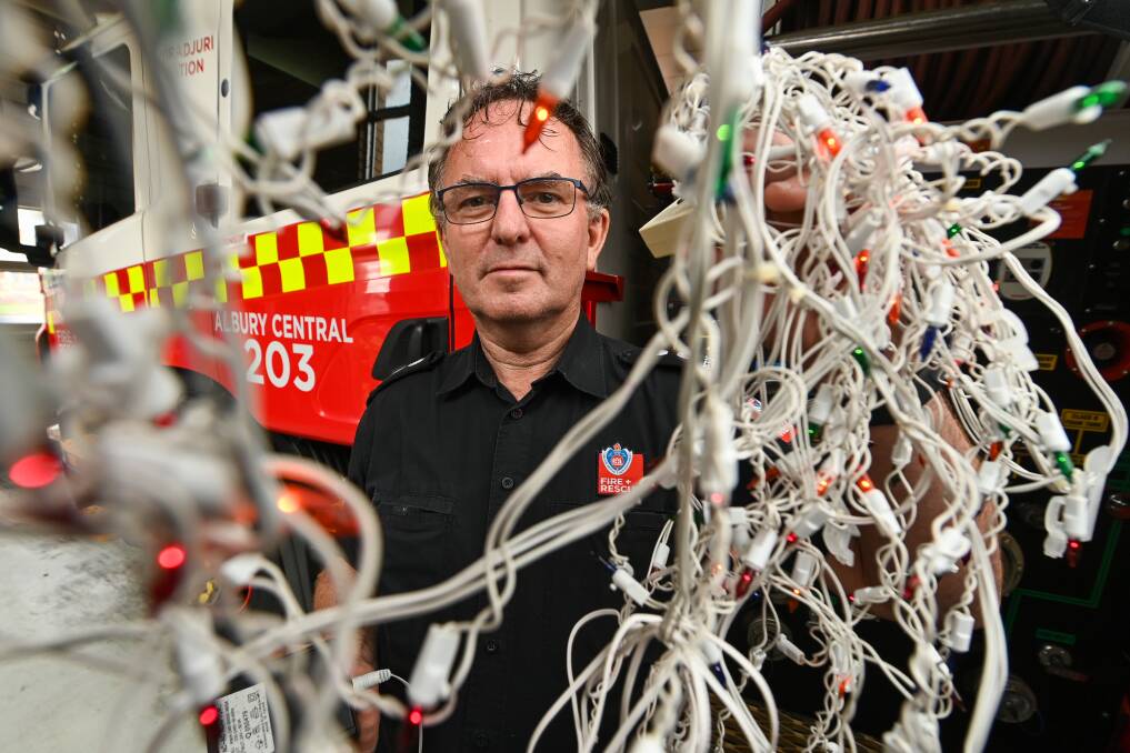 Alex Marschall says unchecked, frayed Christmas tree lights can lead to deadly fires, especially if they are draped on dried out pine trees. He urges people to enjoy the festive season, but to also exercise care. Picture by Mark Jesser