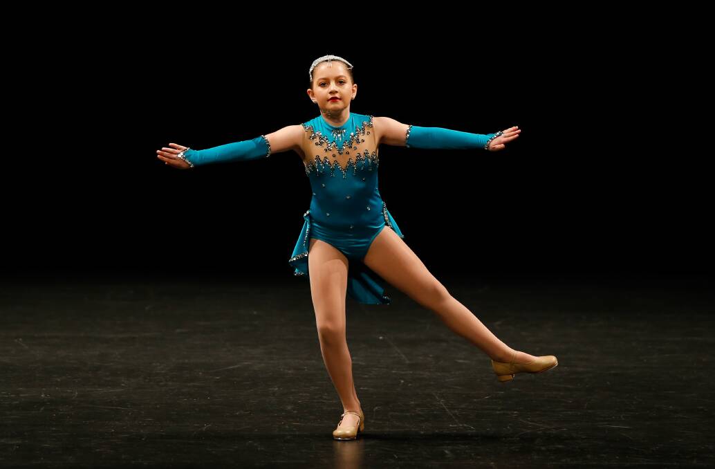 KICKING OUT: Tap is on the agenda for Sarah McDonald, of Young, in the 9 and 10 years open tap solo. The dance program continues this week.