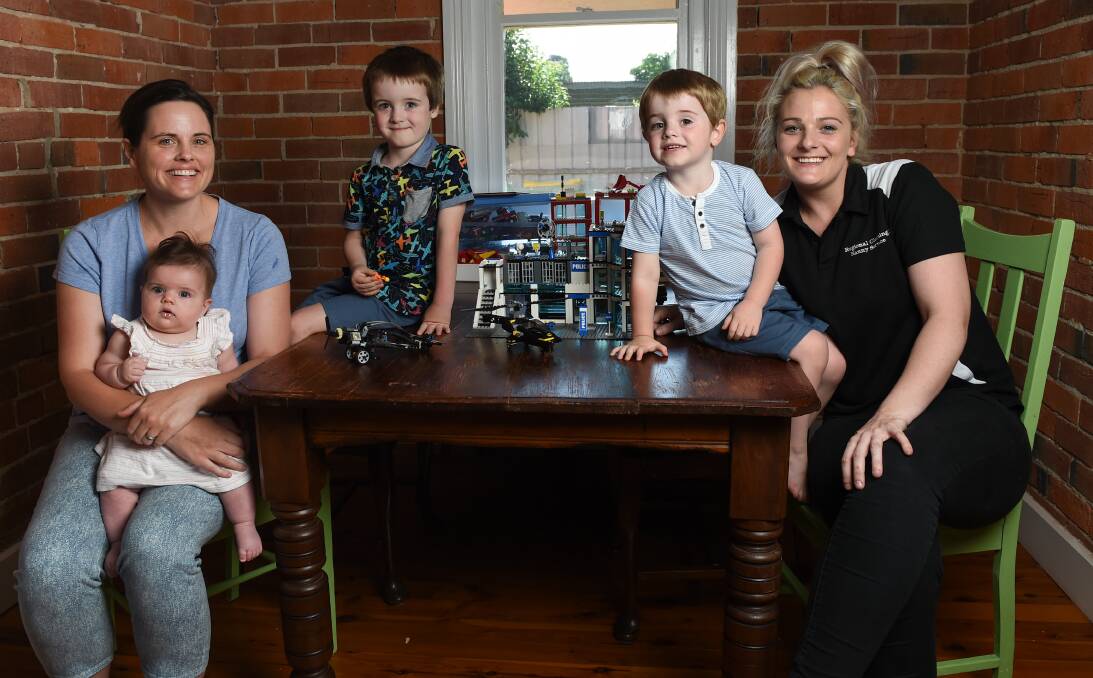 HELPING OUT: North Albury's Sarah Finlayson and her three children, Alice, 4 months, Isaac, 5, and Jude, 3, appreciate the assistance of Lauren Butler, founder of Regional Cleaning and Nanny Service. Picture: MARK JESSER