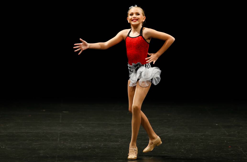 ALL SMILES: The day may be cold, but Olivia Browning, of Yarrawonga, shines warmly for the audience in the 9 and 10 years open tap solo. 