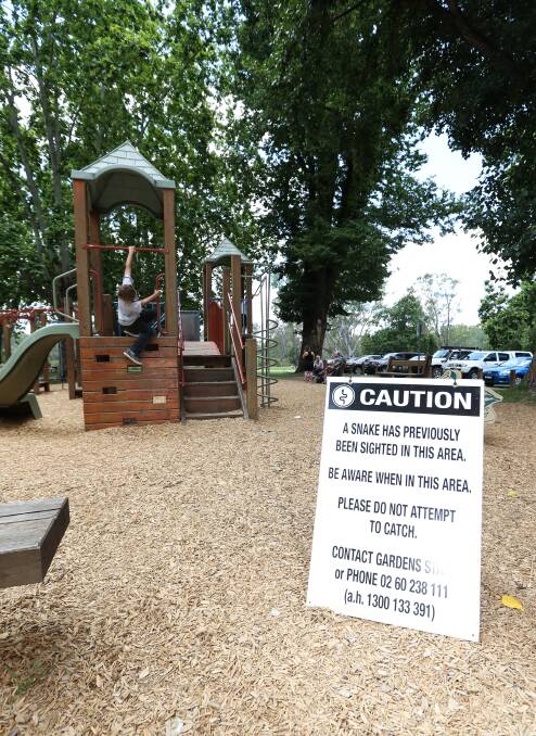 LOOK OUT: The snake warning sign sits in the Noreuil Park playground. 