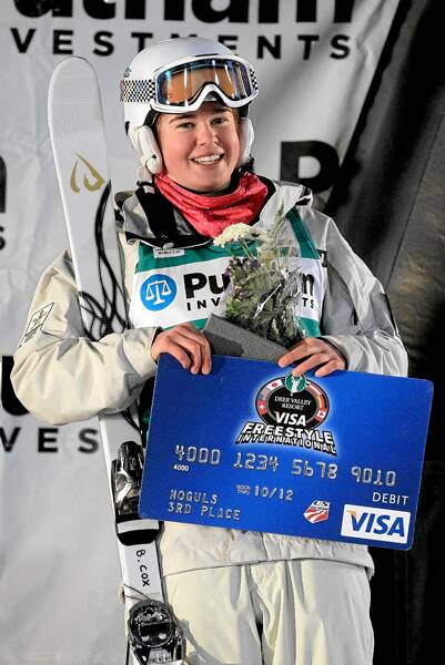 Britteny Cox lives it up on the podium after finishing third in the World Cup moguls. Picture: GETTY IMAGES