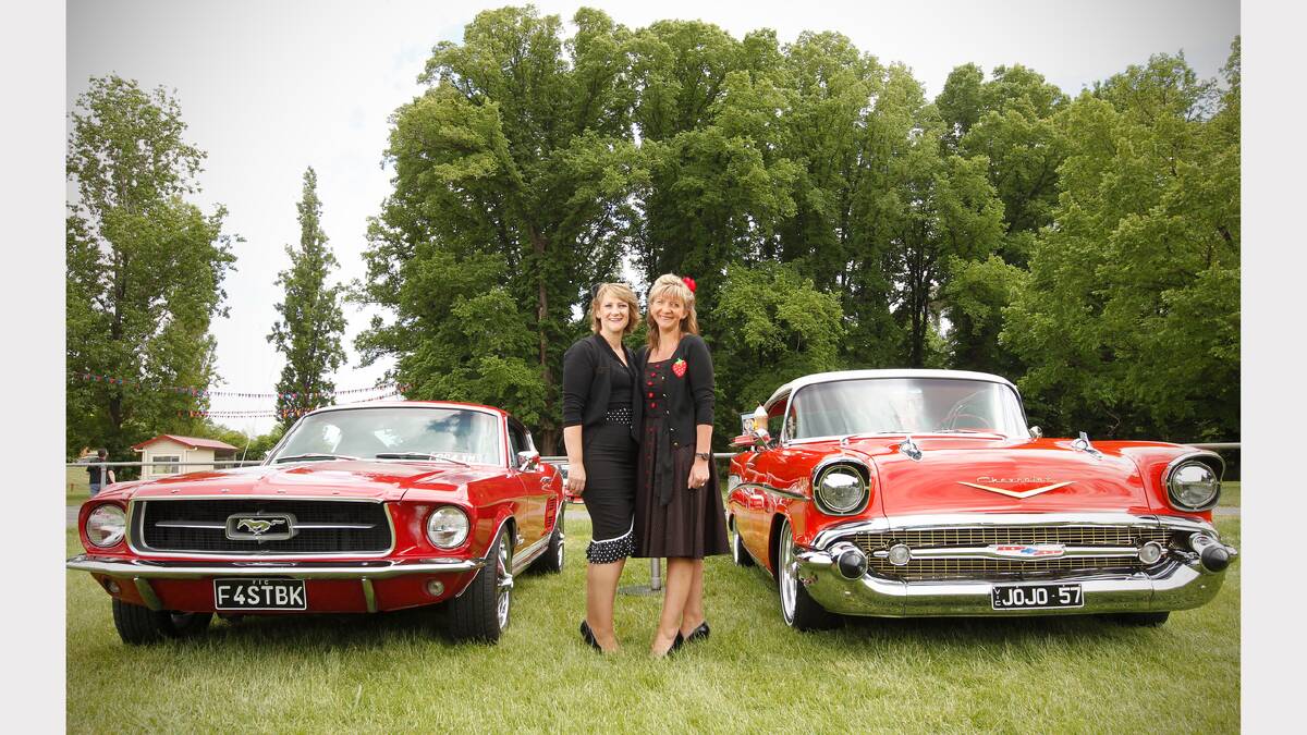 Melbourne's Joanne Woodhouse and Debbie Dalrymple with their '67 Fastback Mustang and 1957 Chevrolet. Picture: BEN EYLES