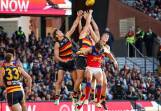 The Crows and the Lions have fought out a tense draw at the Adelaide Oval. (Matt Turner/AAP PHOTOS)