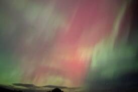 The Aurora Australis lights appeared in the sky above several states on Saturday night. (Ethan James/AAP PHOTOS)
