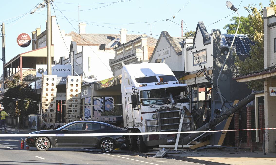 Last month a truck travelling down the Murray Valley Highway, which becomes Rutherglen's Main Street, smashed into a shop front. Picture by Mark Jesser