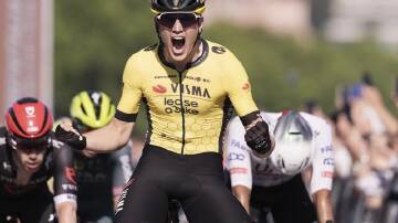 Olav Kooij roars with delight after winning the ninth stage of the Giro d'Italia in Naples. (AP PHOTO)