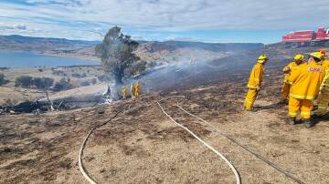 Crews at Sunday's grass and scrub fire at Tangambalanga. Picture supplied